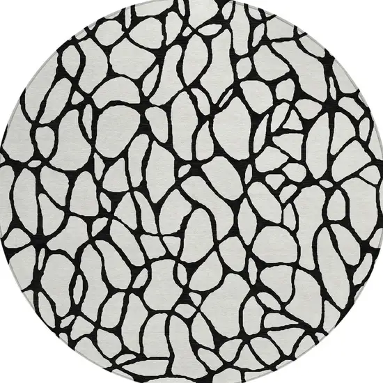 8' Ivory And Black Round Geometric Washable Indoor Outdoor Area Rug Photo 4