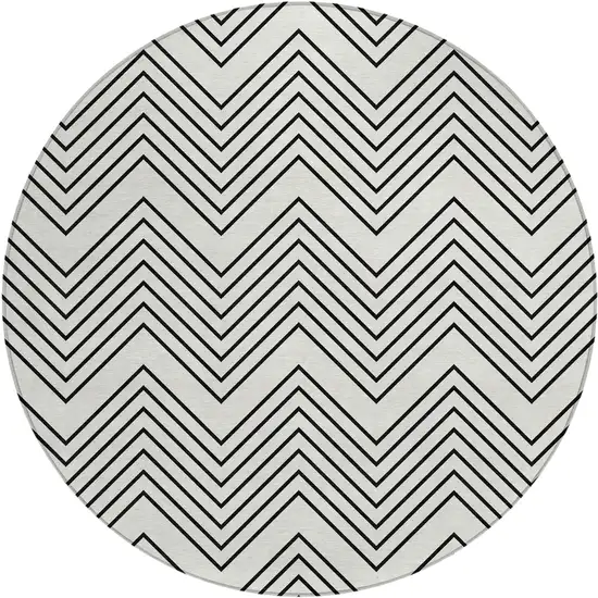 8' Ivory And Black Round Geometric Washable Indoor Outdoor Area Rug Photo 1
