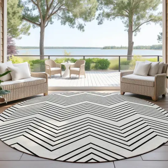 8' Ivory And Black Round Geometric Washable Indoor Outdoor Area Rug Photo 4