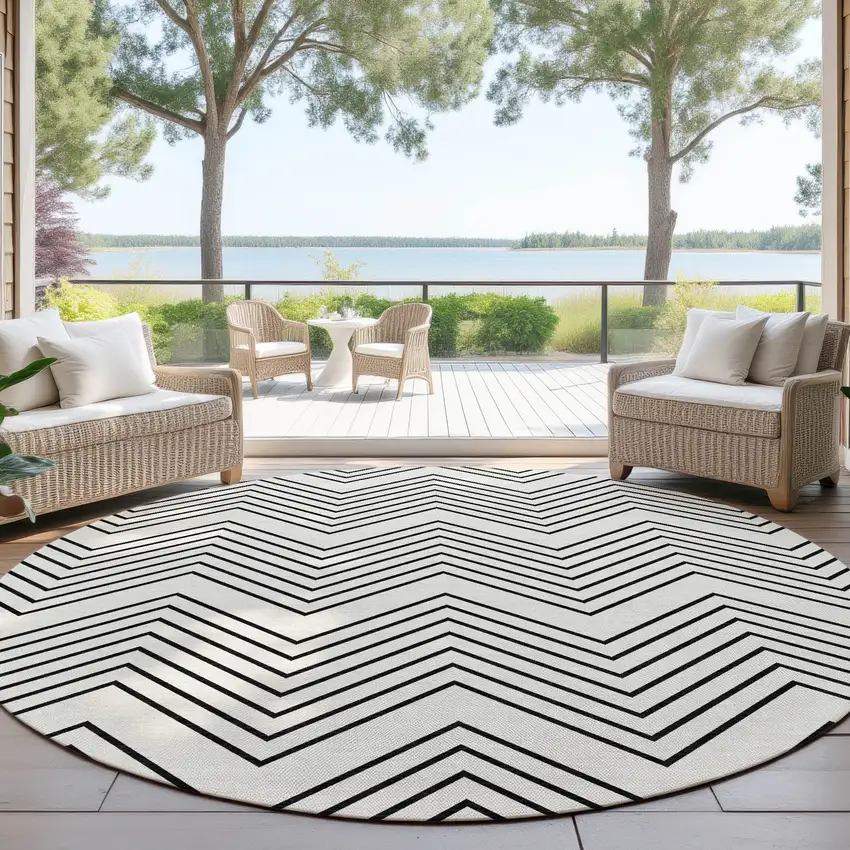 8' Ivory And Black Round Geometric Washable Indoor Outdoor Area Rug Photo 4