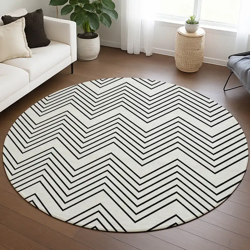 8' Ivory And Black Round Geometric Washable Indoor Outdoor Area Rug Photo 5