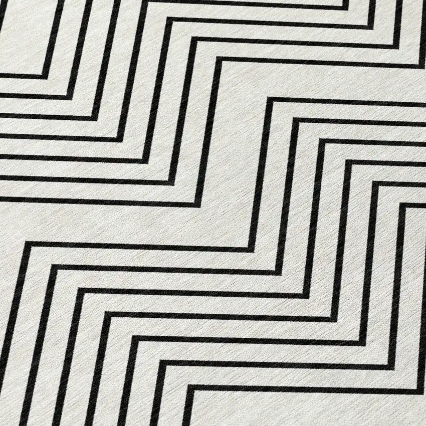 8' Ivory And Black Round Geometric Washable Indoor Outdoor Area Rug Photo 9