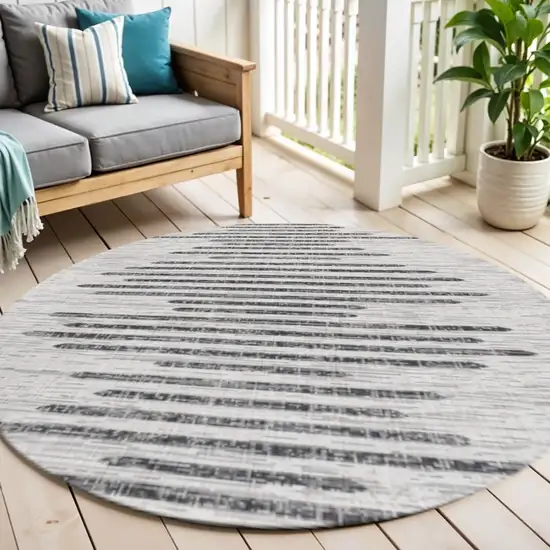 6' Ivory And Black Round Striped Indoor Outdoor Area Rug Photo 1
