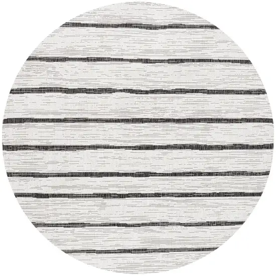 5' Ivory And Black Round Striped Indoor Outdoor Area Rug Photo 1