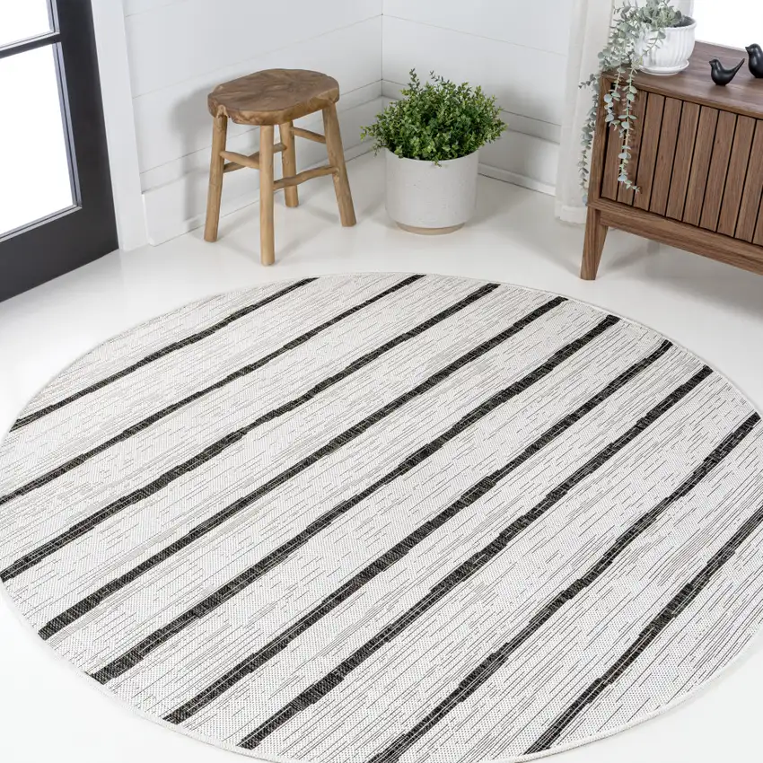 8' Ivory And Black Round Striped Indoor Outdoor Area Rug Photo 4