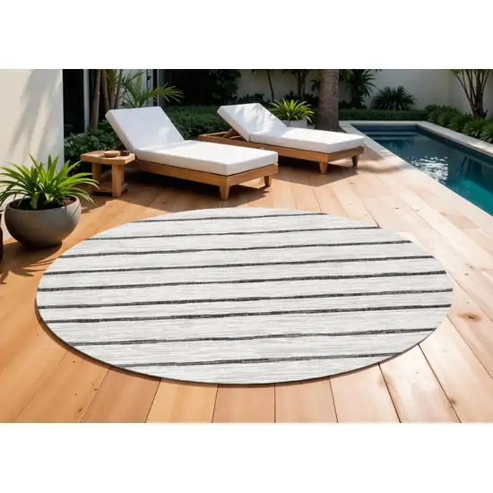 9' Ivory And Black Round Striped Indoor Outdoor Area Rug Photo 1