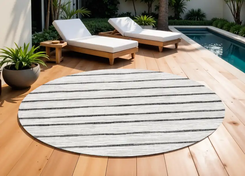 9' Ivory And Black Round Striped Indoor Outdoor Area Rug Photo 1