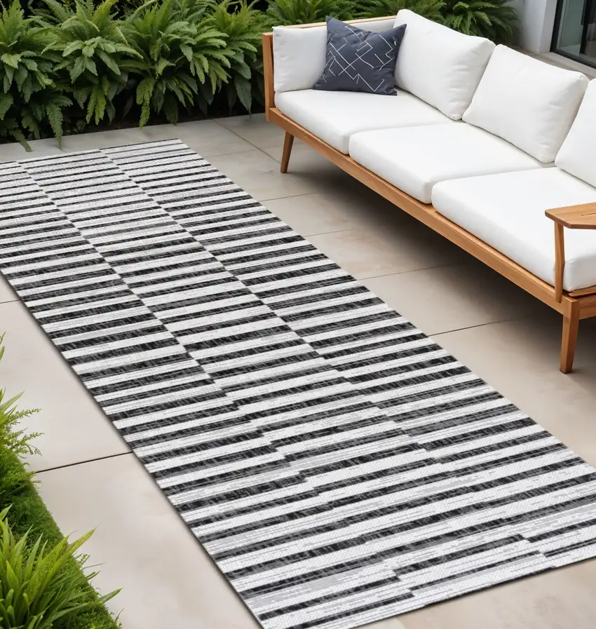8' Ivory And Black Striped Indoor Outdoor Runner Rug Photo 1