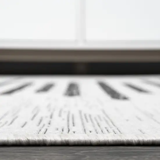 10' Ivory And Black Striped Indoor Outdoor Runner Rug Photo 7