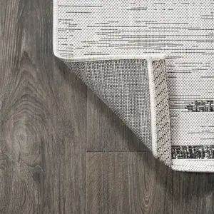 Photo of 20' Ivory And Black Striped Indoor Outdoor Runner Rug