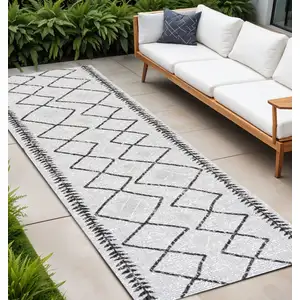 Photo of 8' Ivory And Black Trellis Indoor Outdoor Runner Rug