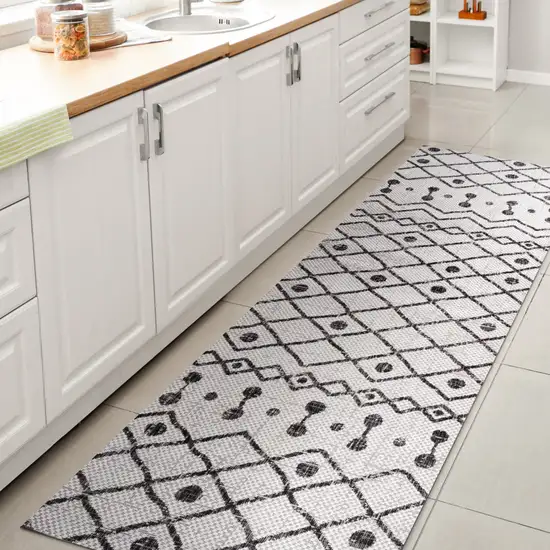 10' Ivory And Black Trellis Indoor Outdoor Runner Rug Photo 6