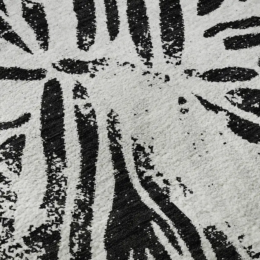 8' Ivory And Black Zebra Print Washable Round Rug With UV Protection Photo 9