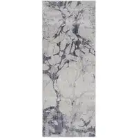 Photo of 10' Ivory And Blue Abstract Power Loom Distressed Runner Rug