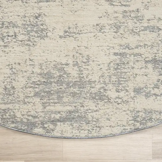 6' Ivory And Blue Abstract Round Rug Photo 5