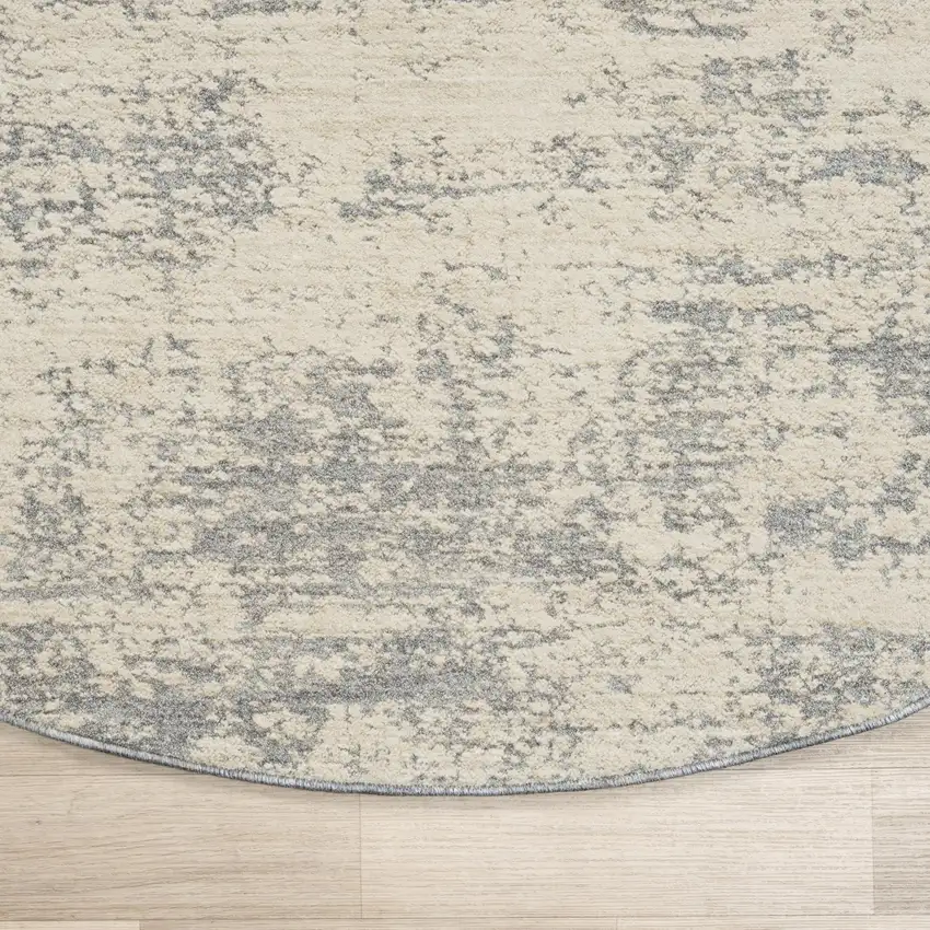 6' Ivory And Blue Abstract Round Rug Photo 5