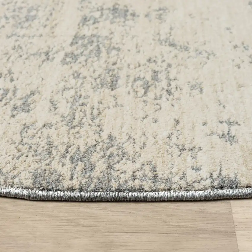 6' Ivory And Blue Abstract Round Rug Photo 3