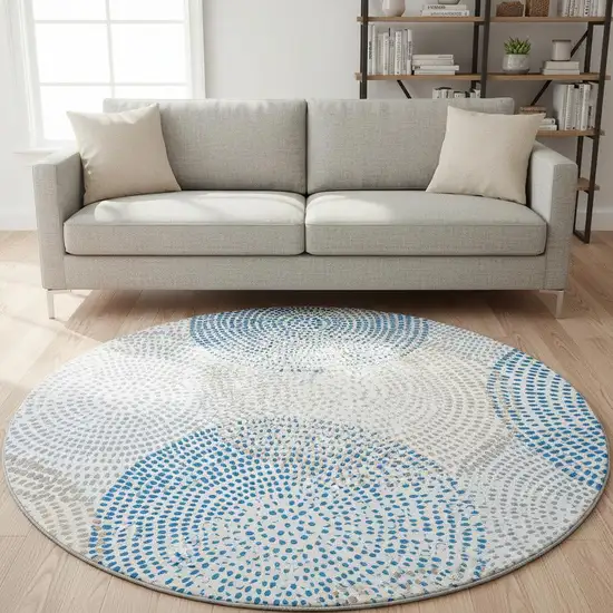 8' Ivory And Blue Abstract Washable Round Rug With UV Protection Photo 2