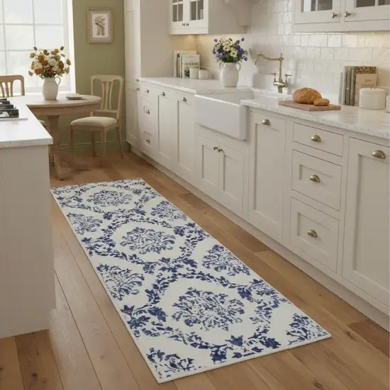 8' Ivory And Blue Damask Distressed Runner Rug Photo 1