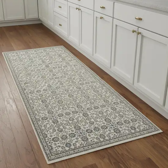 8' Ivory And Blue Floral Runner Rug With Fringe Photo 1