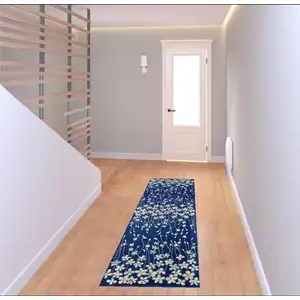 Photo of 7' Ivory And Blue Floral Vines Runner Rug