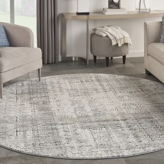 8' Ivory And Blue Geometric Distressed Round Rug With Fringe Photo 4