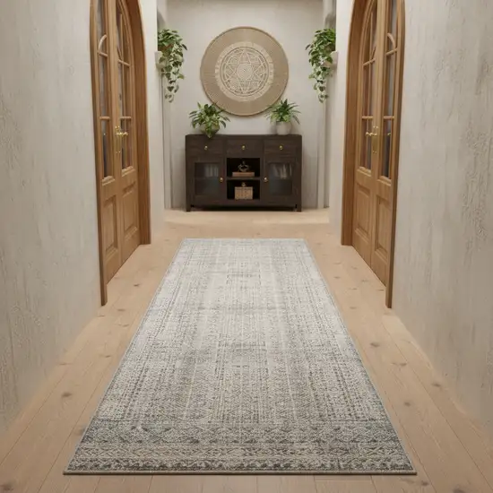 8' Ivory And Blue Geometric Distressed Runner Rug With Fringe Photo 2