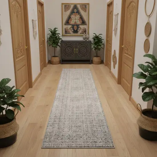 12' Ivory And Blue Geometric Distressed Runner Rug With Fringe Photo 1