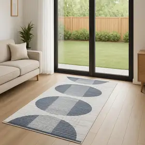 Photo of 6' Ivory And Blue Geometric Runner Rug