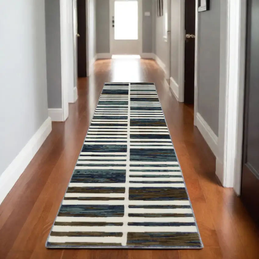8' Ivory And Blue Geometric Runner Rug Photo 1