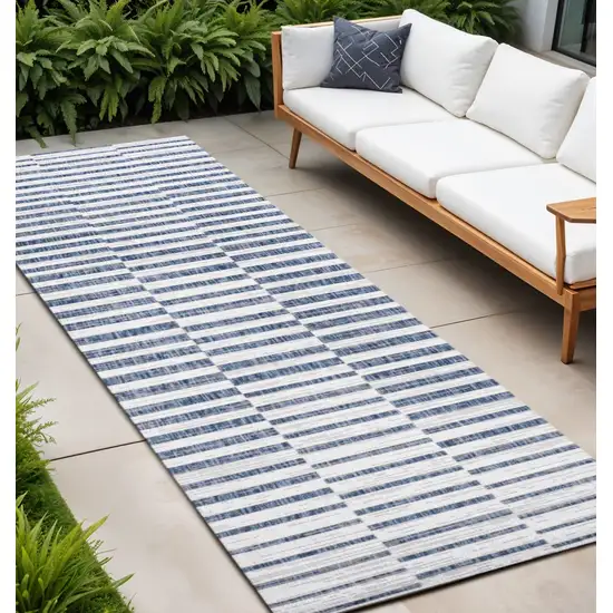 8' Ivory And Blue Striped Indoor Outdoor Runner Rug Photo 1