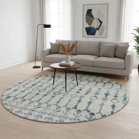 8' Ivory And Blue Tribal Washable Round Rug With UV Protection Photo 1