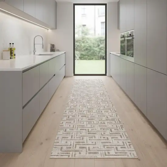8' Ivory And Brown Geometric Runner Rug Photo 1