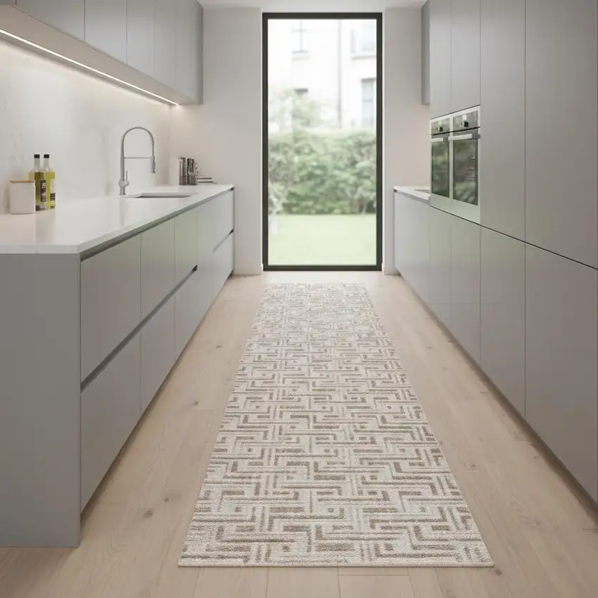 8' Ivory And Brown Geometric Runner Rug Photo 1