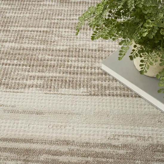 8' Ivory And Brown Geometric Runner Rug Photo 9