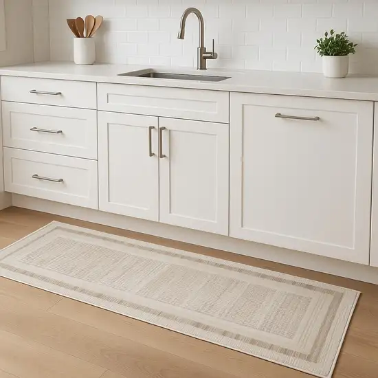 8' Ivory And Brown Geometric Runner Rug Photo 1