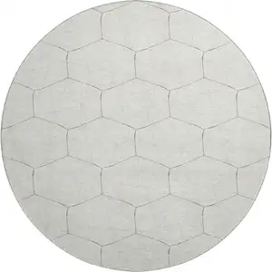 Photo of 8' Ivory And Brown Geometric Washable Round Rug With UV Protection