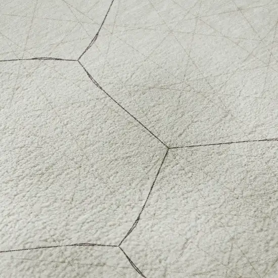 8' Ivory And Brown Geometric Washable Round Rug With UV Protection Photo 8