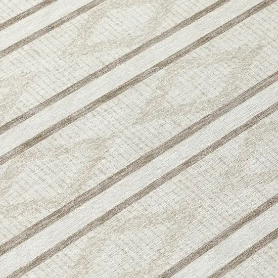 8' Ivory And Brown Round Geometric Washable Indoor Outdoor Area Rug Photo 7