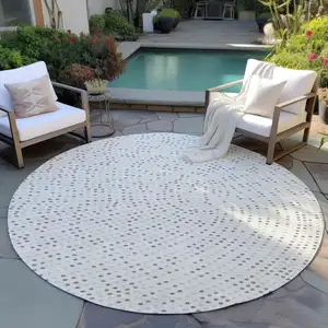 Photo of 8' Ivory And Brown Round Polka Dot Washable Indoor Outdoor Area Rug