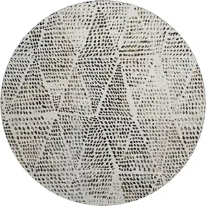 Photo of 8' Ivory And Charcoal Diamond Washable Round Rug With UV Protection