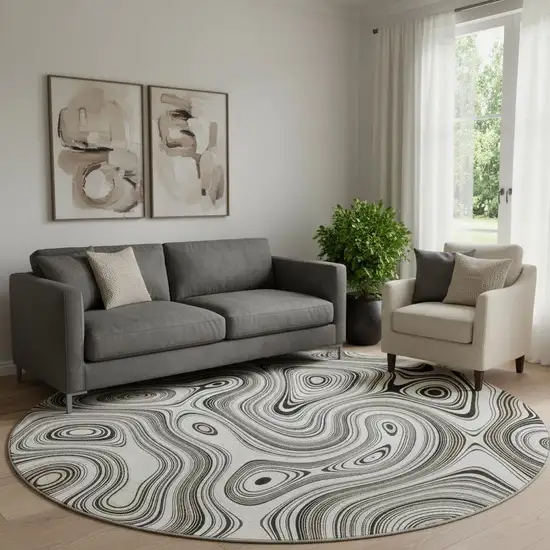 8' Ivory And Charcoal Geometric Washable Round Rug With UV Protection Photo 2