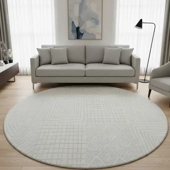 8' Ivory And Cream Geometric Washable Round Rug With UV Protection Photo 2