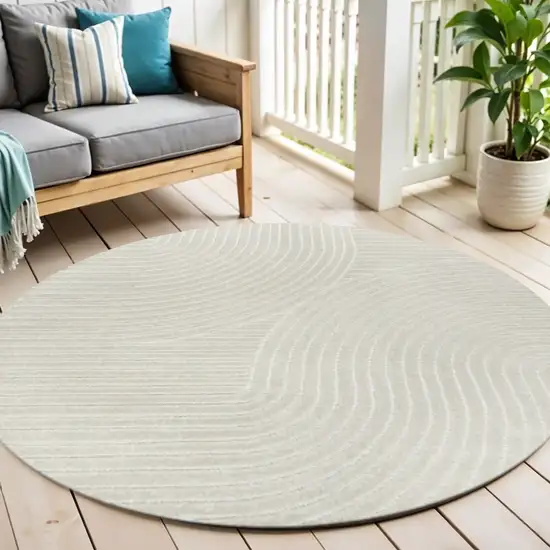 8' Ivory And Cream Round Striped Indoor Outdoor Area Rug Photo 1