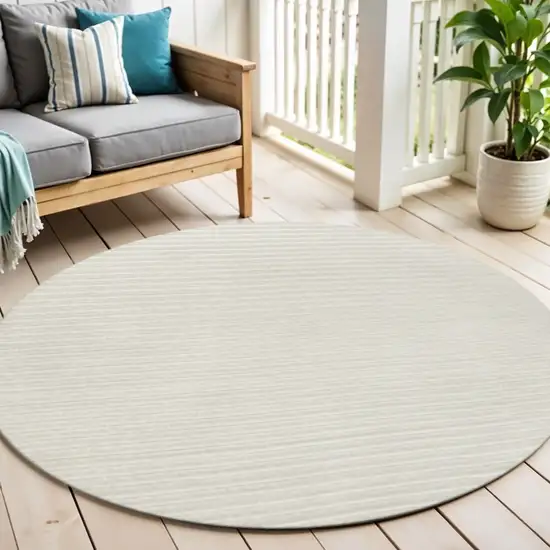 5' Ivory And Cream Round Striped Indoor Outdoor Area Rug Photo 1
