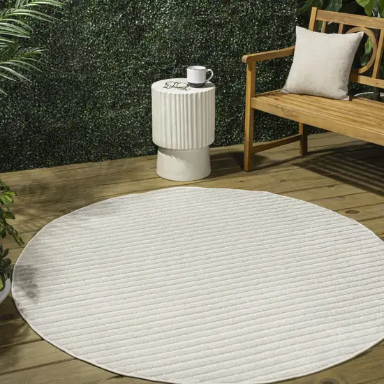 7' Ivory And Cream Round Striped Indoor Outdoor Area Rug Photo 5