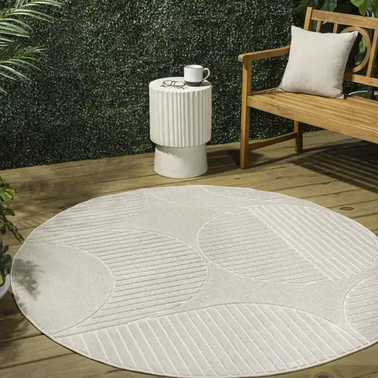 7' Ivory And Cream Round Striped Indoor Outdoor Area Rug Photo 5