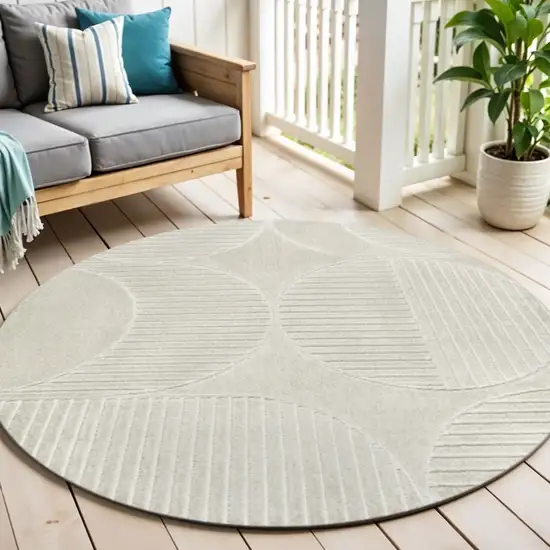 7' Ivory And Cream Round Striped Indoor Outdoor Area Rug Photo 1
