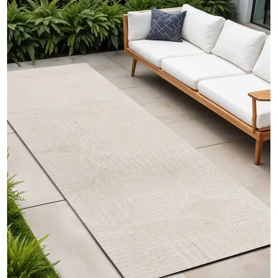 10' Ivory And Cream Striped Indoor Outdoor Runner Rug Photo 1