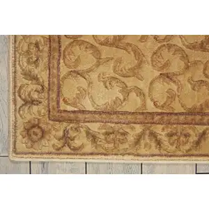 Photo of 6' Ivory And Gold Floral Non Skid Runner Rug